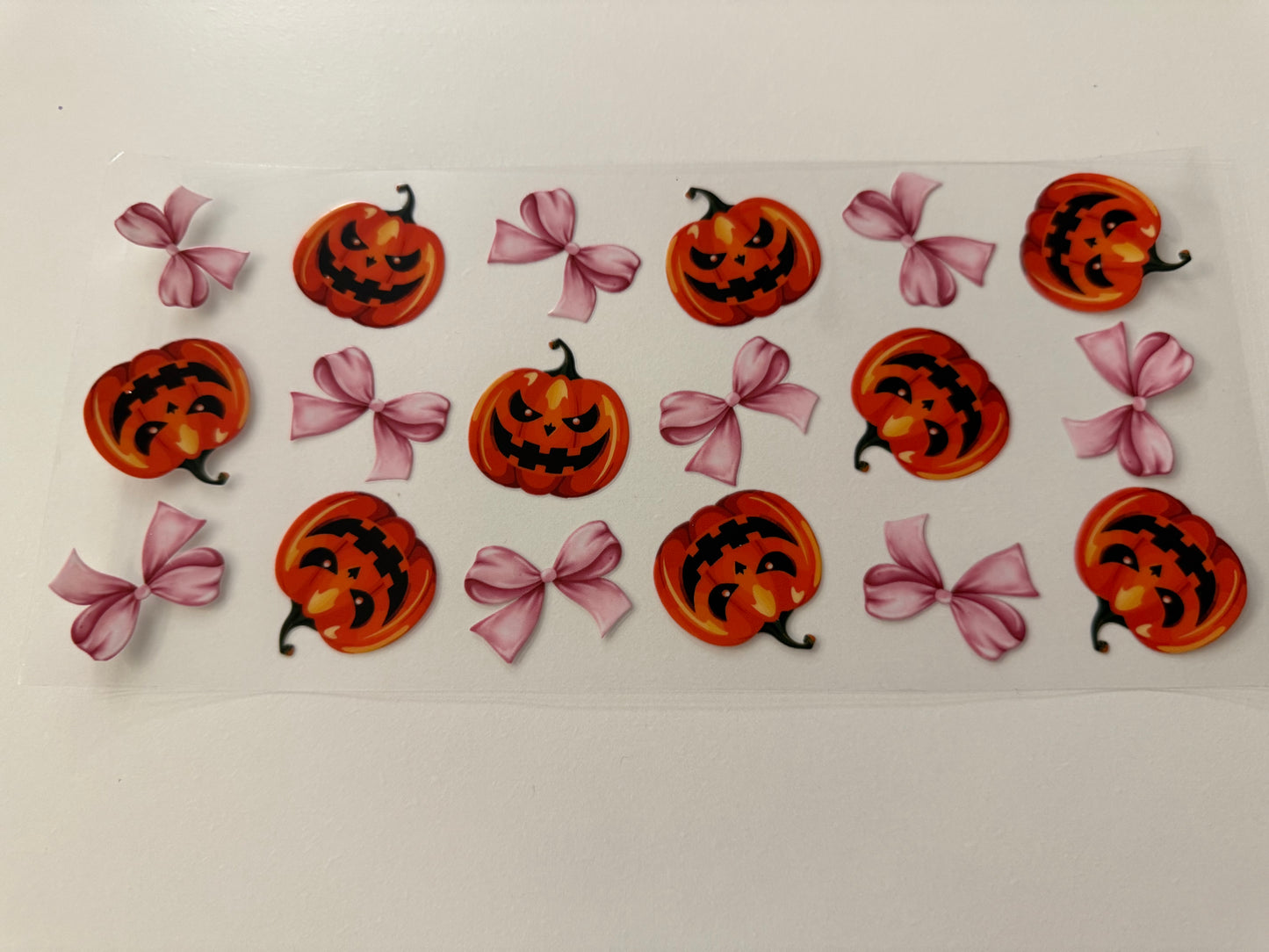 Pumpkins and pink bows