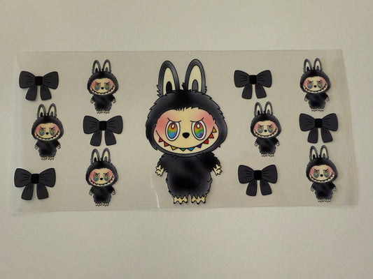 Black monster with bows