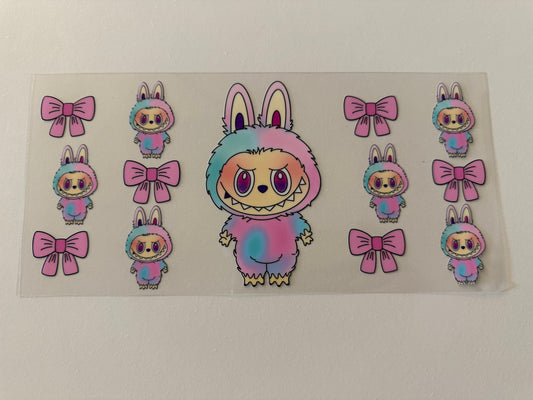 Pink monster with bows