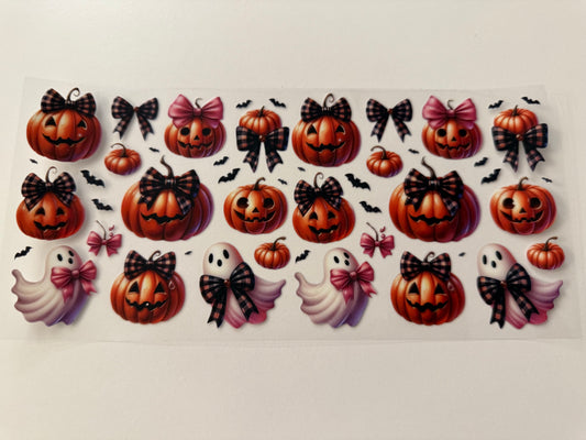 Ghost and pumpkins with bows